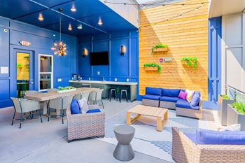 Rooftop lounging area with outdoor tvs